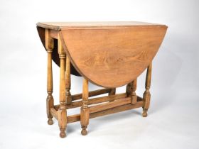 A Mid 20th Century Oak Drop Leaf Gate Leg Table, 90cms Wide