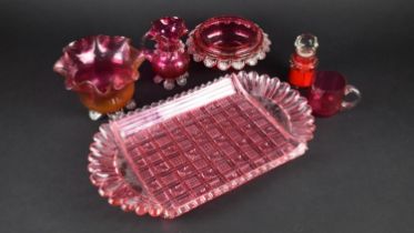 A Collection of Various Cranberry Glass to comprise Jug, Bowls, Tray (AF)