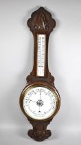 A Late Victorian/Edwardian Onion Topped Oak Wheel Barometer with Thermometer