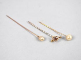 Three Various Hat/Tie Pins to include 15ct Gold Mounted Example, 16ct Gold Mounted Example with Faux