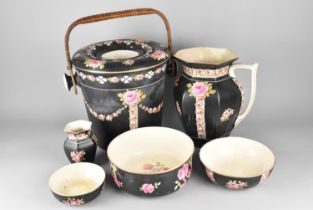 An Early 20th Century Crown Ducal Toilet Set Decorated with Rose Swag Decoration on Black Ground