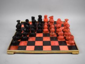 A Mid 20th Century Chess Set and 33cms Board