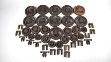 A Collection of Cast Metal Miniature Locomotive Wheels, 10cms and 7cms Diameter together with