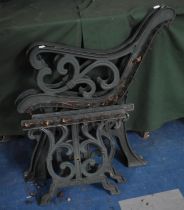 A Pair of Cast Metal Bench Ends with Matching Table Base and a Further Pair of Bench Ends