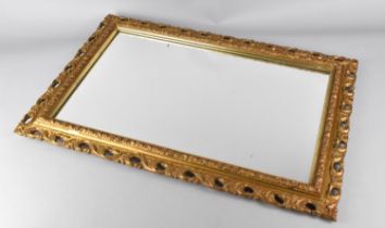 An Ornate Gilt Rectangular Carved and Pierced Mirror, 39.5x60cm