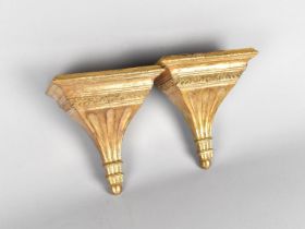 A Pair of Reproduction Gilt Painted Wall Hanging Sconce Shelves, 16cms High and 14.5cms Wide