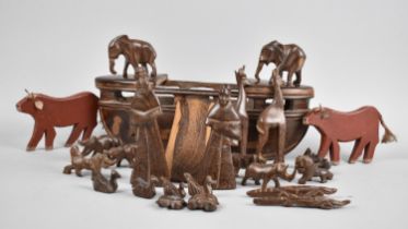 A Far Eastern/African Carved Wooden Noah's Ark with Figures and Animals together with Two Fret Cut