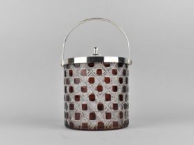 A Reproduction Silver Plate Mounted Cylindrical Overlaid Hobnail Glass Biscuit Barrel, 12.5cms