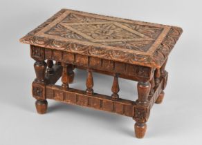 A Late 19th/Early 20th Century Carved Oak Rectangular Stool with Spindle Supports, 35.5cms x 25cms x