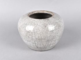 A Chinese Monochrome Crackle Glazed Pot of Squat Form, 7cm high