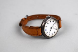 An Early 20th Century Silver Case Wrist Watch with Enamel Face having Roman Numerals and