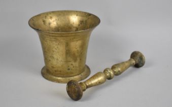 A Reproduction Brass Pestle and Mortar, 12cms Diameter