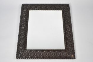 An Edwardian Carved Framed Rectangular Wall Mirror, 65x78cms