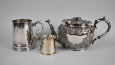 A Silver Plated Teapot, Silver Plate Christening Mug Dated 1879 and a Silver Plated Glass Bottomed