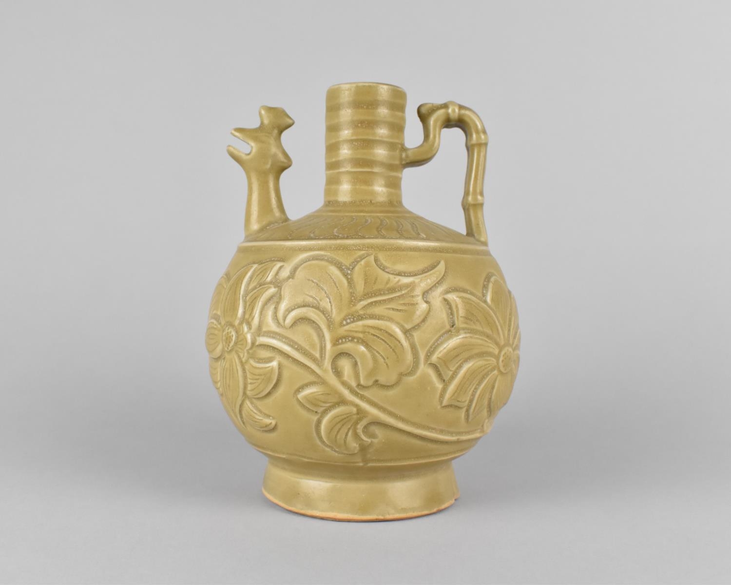 A Chinese Celadon Ewer the Body Decorated with Incised Foliage Design and Having Zoomorphic Spout,