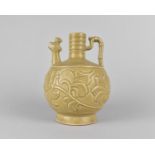 A Chinese Celadon Ewer the Body Decorated with Incised Foliage Design and Having Zoomorphic Spout,