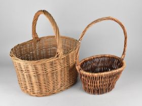 A Vintage Wicker Shopping Basket and a Modern Wicker Flower Basket