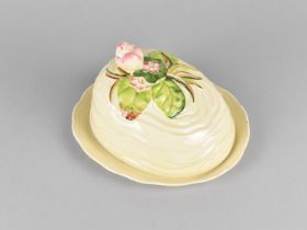 A Clarice Cliff Butter Dish Decorated with Water Lily Design, impressed 103A to the Base and Printed