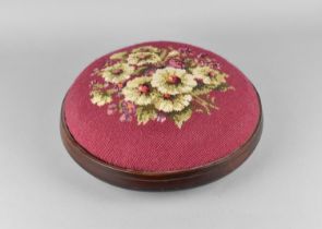 An Edwardian Circular Tapestry Topped Footstool, 31cms Diameter