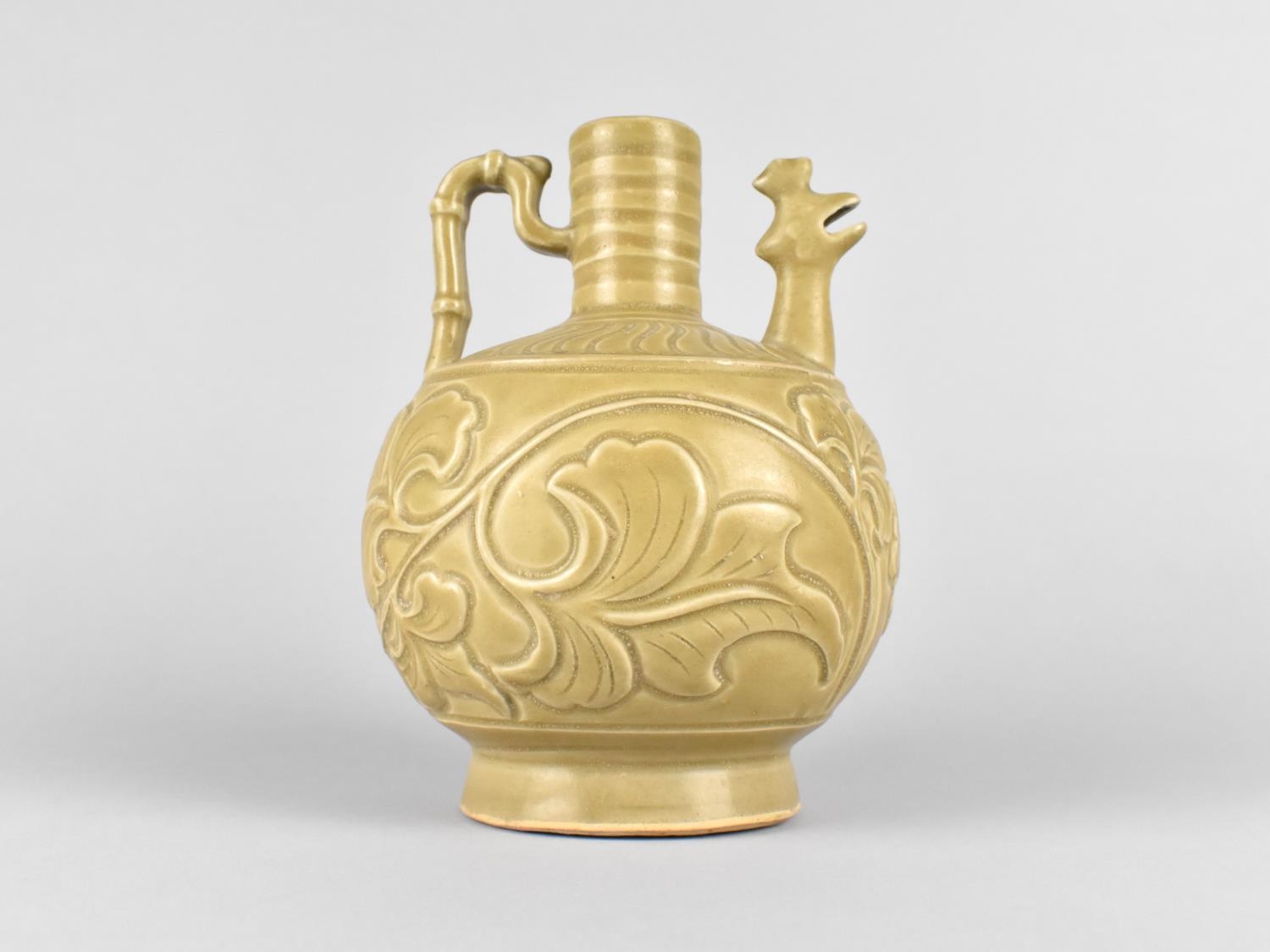 A Chinese Celadon Ewer the Body Decorated with Incised Foliage Design and Having Zoomorphic Spout, - Image 2 of 3