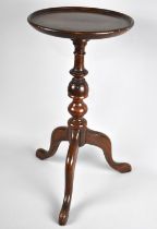 A Mahogany Tripod Wine Table, 24cms Diameter and 49cms High