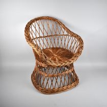 A Modern Childs Wicker Tub Armchair