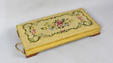 A Rectangular Tapestry Topped Footstool, 70x34cms