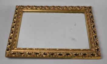 A Vintage Pierced Gilt Framed Wall Mirror with Bevelled Glass, 37x30cms