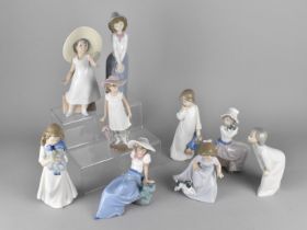 A Collection of Eight Various Nao Figures Together with a Lladro Example