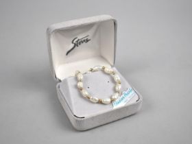 A 9ct Gold and Pearl Bracelet