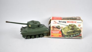 A Triang Minic Series II Clockwork Powered Sherman Tank in Box, a Self Steering Electric Car,