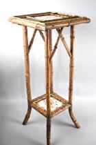 An Edwardian Bamboo Two Tier Plant Stand with Tiled Top and Stretcher Shelf, 30cns Square and