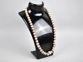 An Iridescent Pearl Necklace