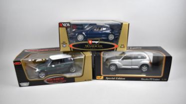 Three Large Boxed Die Casts, Burago, Maserati 3200 GT, Motor Mec Mini and Maisto Chrysler PT Cruiser