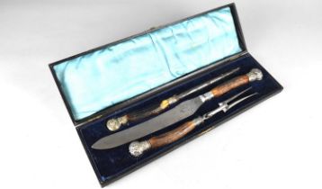 A Late Victorian/Edwardian Cased Three Piece Carving Set with Silver Plated Mounts and Horn Handles