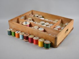 A Vintage Cutlery Box Containing Various Cottons