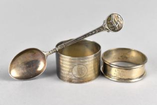 Two Silver Napkin Rings and a Silver Trophy Teaspoon, 49g