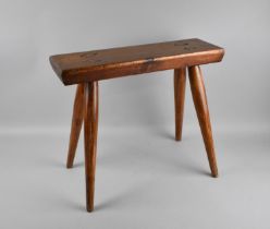 A Narrow Rectangular Topped Stool, 46cms by 14.5cms on Four Turned Splayed Supports