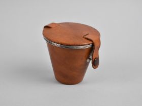 A Leather Covered Set of Four Graduated Stainless Steel Stirrup Cups, 7cms High