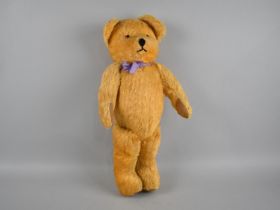 A Mid 20th Century Plush Teddy Bear, 41cms High