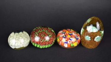 Four Various Millefiori Glass Paperweights