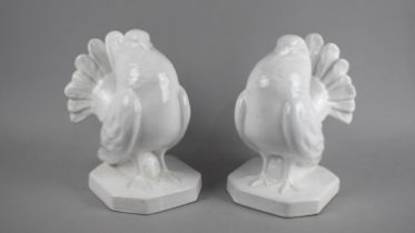 A Pair of White Glazed Ceramic Studies of Fan Tailed Pigeons, 20.5cms High