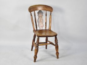 A Single Elm Seated Side Chair with Pierced Splat