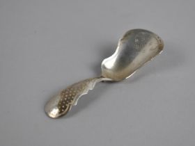 A Russian Silver Caddy Spoon with Bright Cut Decoration, 9cm