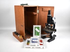 A Vintage Cooke, Troughton and Simms Monocular Microscope in Fitted Box with Four Packs of