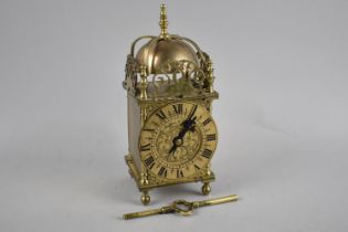 A Reproduction Brass Lantern Clock with Key, 23cms High