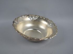 An Indian Silver Bowl with Floral Scrolled Trim in Relief, Stamped Silver to Base, 20cm Diameter
