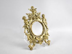 A Late 19th Century Cast Brass Clock Surround with Cherub Decoration, Probably French, 23cms High