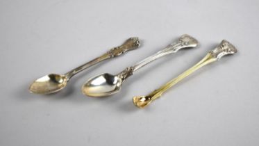 A Victorian Parcel Gilt Silver Salt Spoon Together with Two Victorian Silver Teaspoons, all with