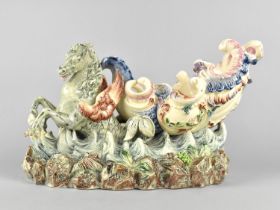 A Continental Majolica Centrepiece in the Form of Mythical Winged Merhorses/Hippocampus Pulling